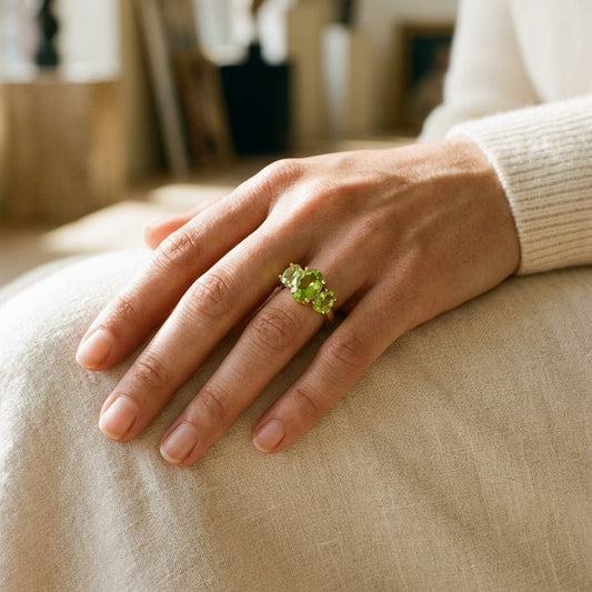 Peridot Oval Three Stone Ring in 14K Yellow Gold - editorial