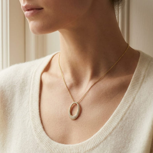 Natural Diamond Oval Pendant in 14K Yellow Gold, worn close-up portrait