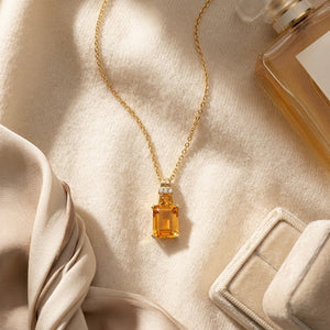 Citrine & Diamond Emerald Cut Pendant in 14K Yellow Gold - flat lay