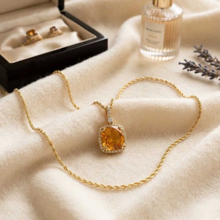 Citrine & Diamond Halo Cushion-Cut Pendant in 14K Yellow Gold - flat lay