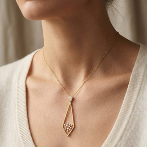 Natural Diamond Round Brilliant Pendant in 14K Yellow Gold, 3 ct. t.w., worn close-up portrait