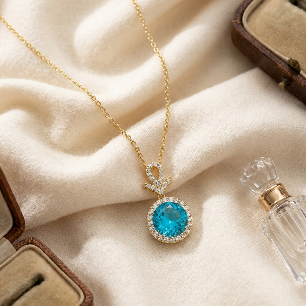 Blue Topaz & Diamond Pave Halo Pendant in 14K Yellow Gold - flat lay