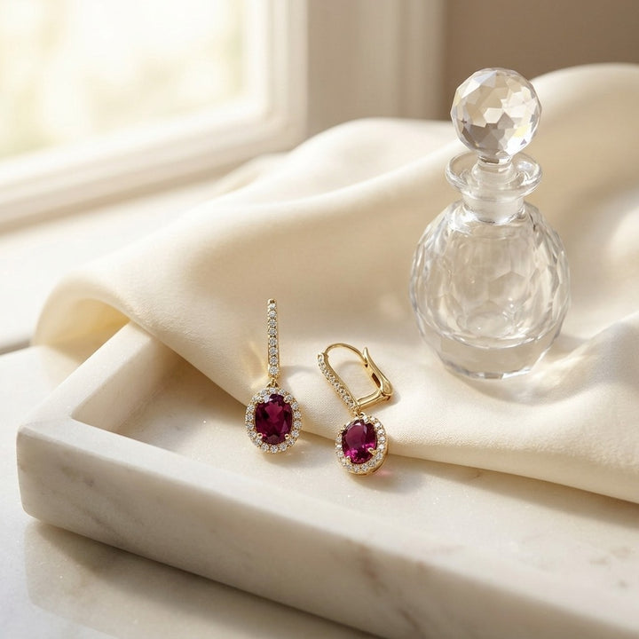 Rhodolite Garnet & Diamond Oval Halo Dangle Earrings with Pave Leverbacks in 14K Yellow Gold - editorial