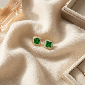 Tsavorite & Diamond Square Invisible-Cut Stud Earrings in 14K Yellow Gold - flat lay