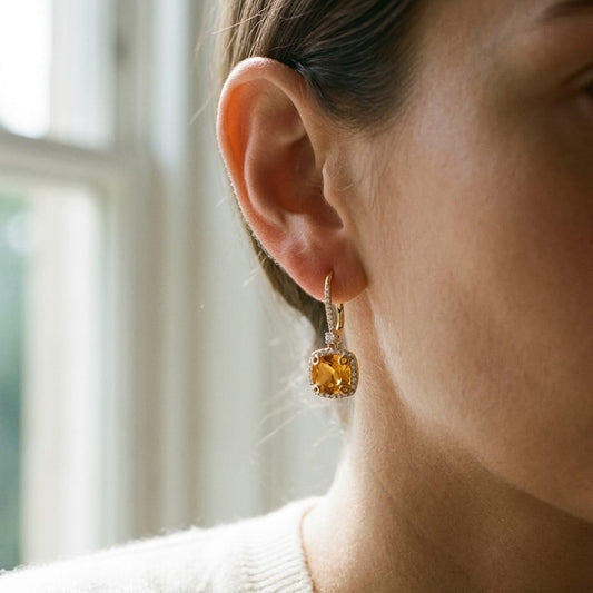 Citrine And Diamond Halo Cushion Dangle Earrings in 14K Yellow Gold 0.28ctw, worn close-up portrait