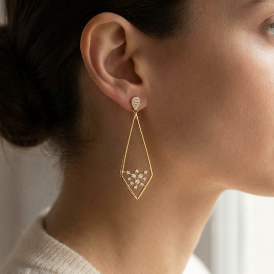 Diamond Pave Elongated Diamond Shaped Earrings in 14K Yellow Gold, worn close-up portrait