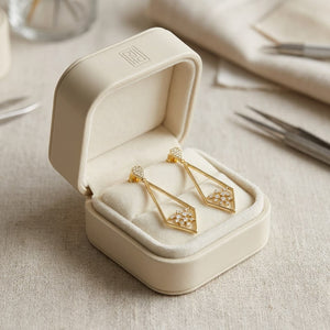Diamond Pave Elongated Diamond Shaped Earrings in 14K Yellow Gold, in navy velvet jewelry box