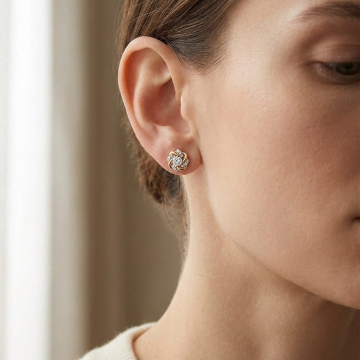 Natural Diamond Round Brilliant Stud Earrings in 14K Yellow Gold, worn close-up portrait