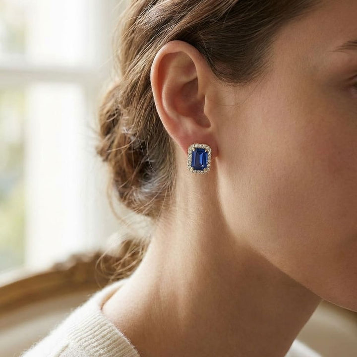 Sapphire and Diamond Halo Earrings in 14K Yellow Gold, 0.22ct, worn close-up portrait