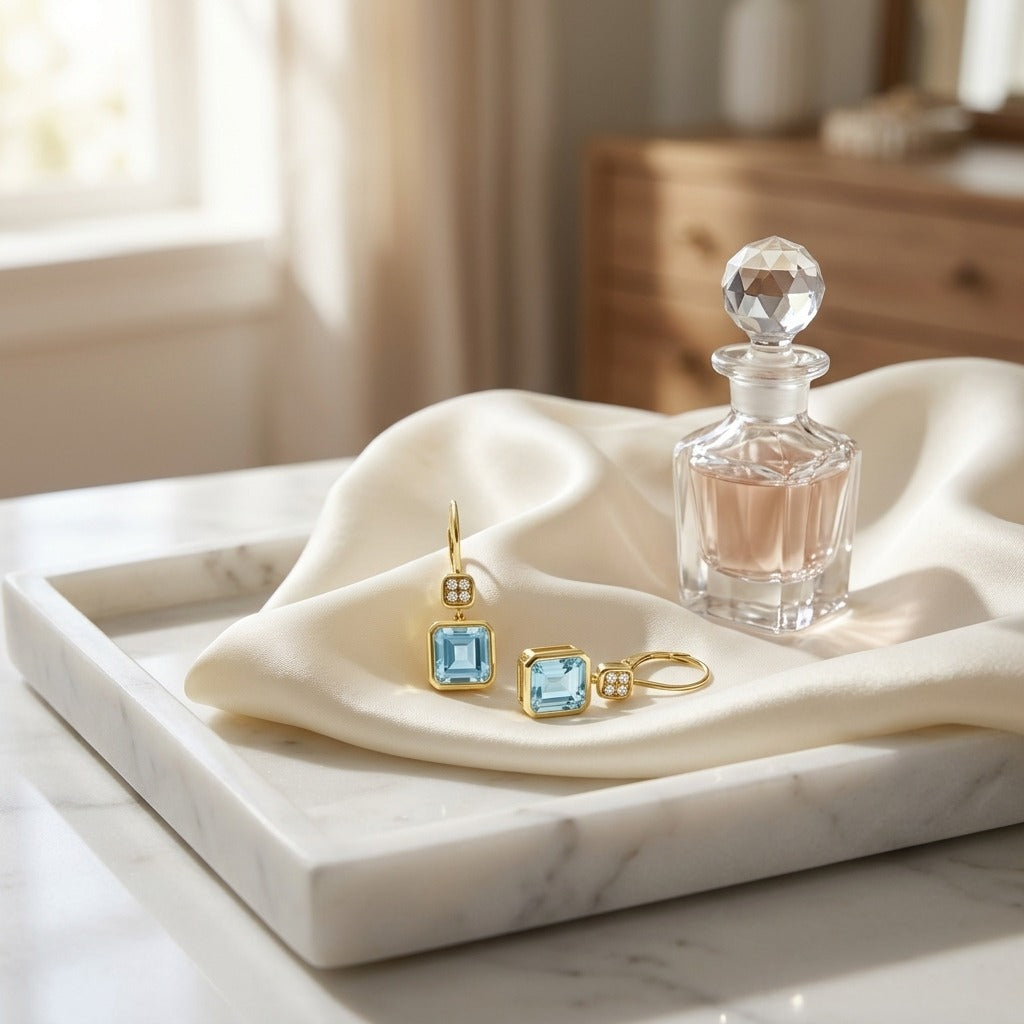 Swiss Blue Topaz Bezel Earrings 0.08ctw in 14K Yellow Gold - editorial