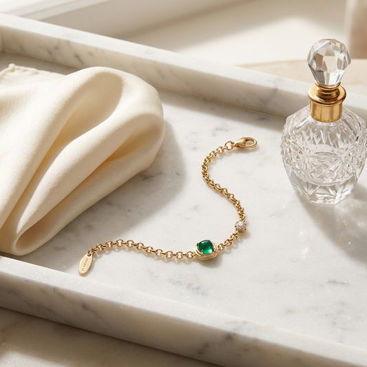 Diamond Bracelet with Created Emerald 7x5 Cushion Bracelet in 14K Yellow Gold - editorial