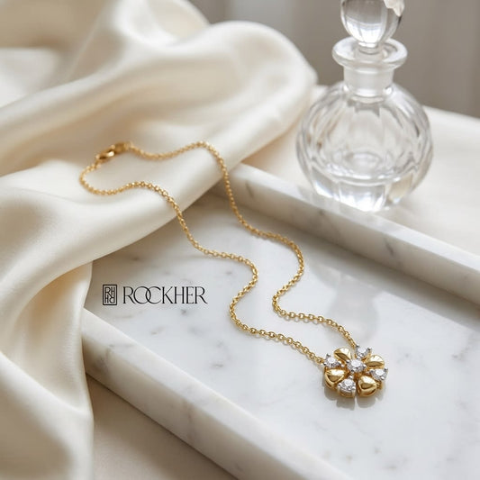 Diamond 4-cross Necklace With High-polish Accent in 14K Yellow Gold, 16-18 Inch, on marble vanity tray with silk