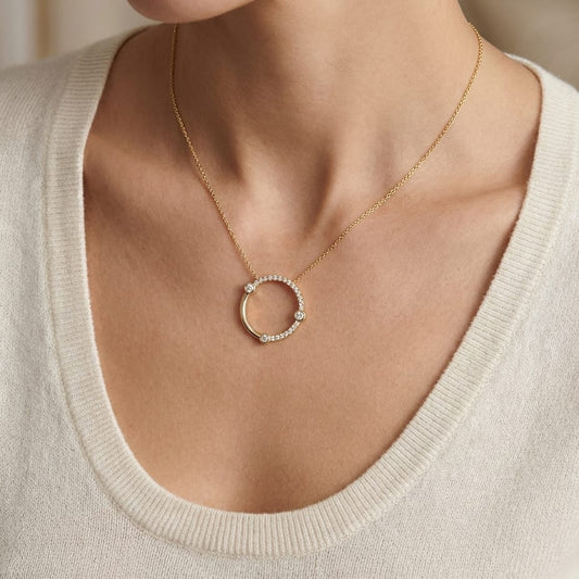 Diamond Circle Necklace With Bezel And High Polish Accent in 14K Yellow Gold, worn close-up portrait