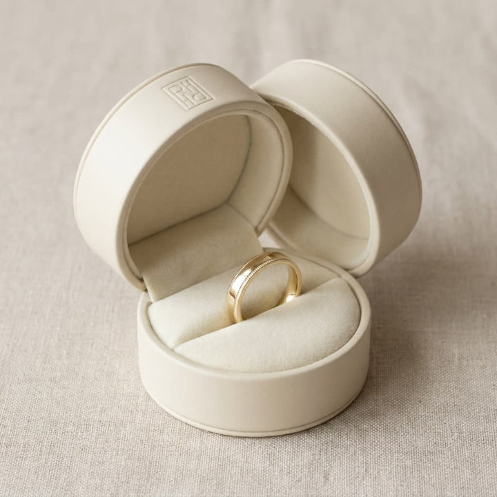 4mm Flat Milgrain Comfort-Fit Wedding Band in 14K Yellow Gold, in navy velvet jewelry box