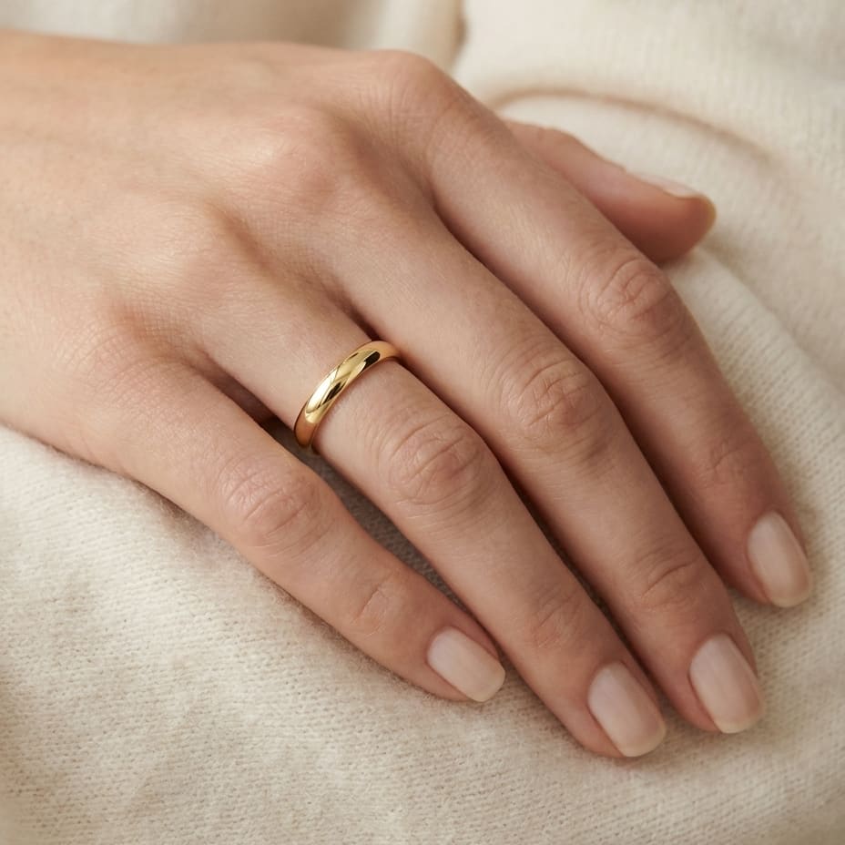 3.5mm Flat Comfort-Fit Wedding Band in 14K Yellow Gold, worn on hand, close-up