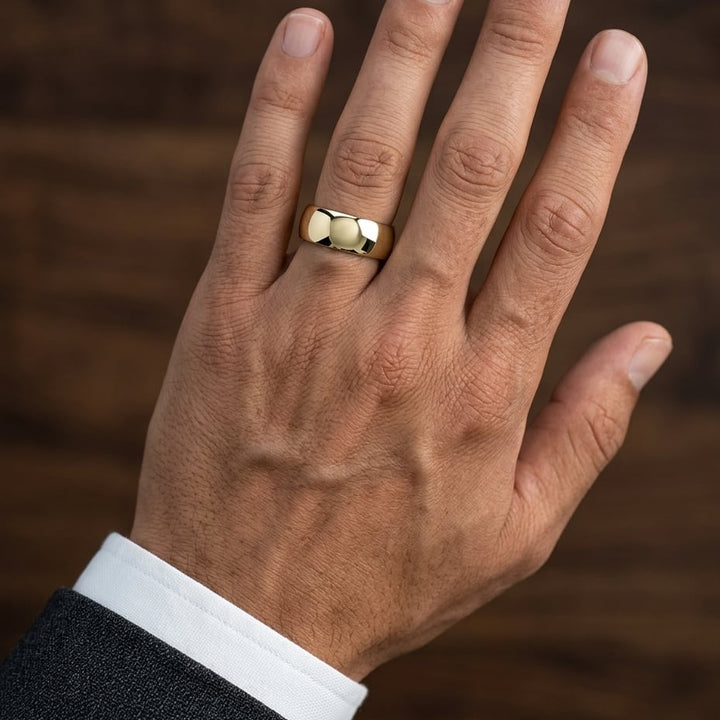 10mm High Dome Comfort-Fit Wedding Band in 14K Yellow Gold, worn on hand, masculine close-up