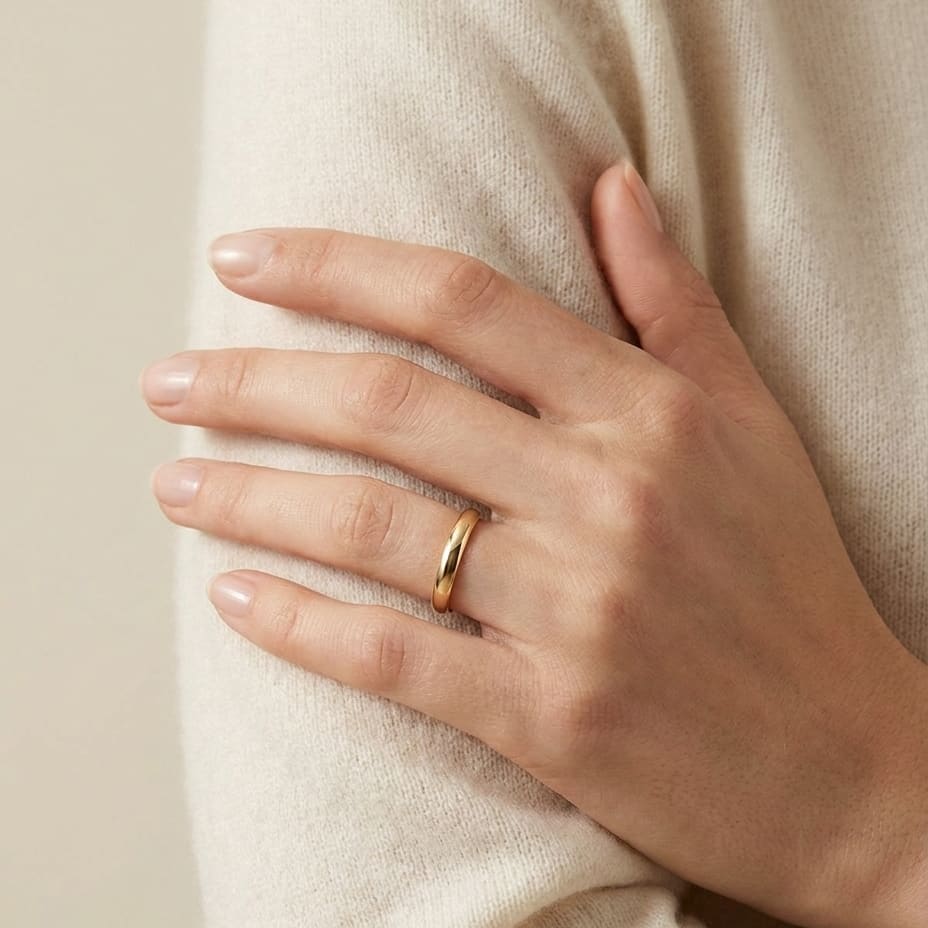 3mm Slightly Domed Super Light Comfort-Fit Wedding Band in 14K Yellow Gold, worn on hand, full view