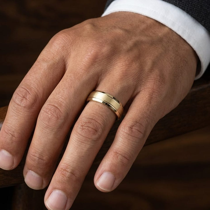 7mm Satin Finish High Polished Beveled Edge Carved Wedding Band in 14K Yellow Gold, worn on hand, masculine close-up