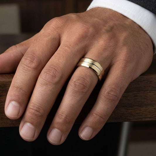 6mm Satin Finish Carved Wedding Band in 14K Yellow Gold, worn on hand, masculine close-up