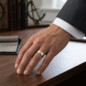 7mm Satin Finish Carved Wedding Band in 14K Yellow Gold, worn on hand, masculine full view
