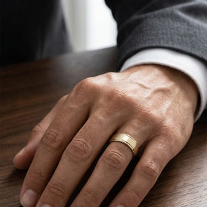 8mm Satin Finish High Polished Round Edge Carved Wedding Band in 14K Yellow Gold, worn on hand, masculine close-up