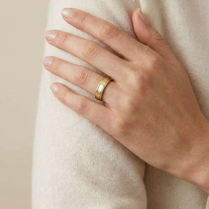 4mm Satin Finish High Polished Round Edge Carved Wedding Band in 14K Yellow Gold, worn on hand, full view