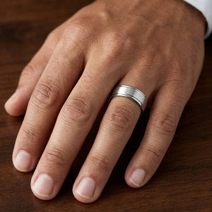 7mm Satin Finish High Polished Round Edge Carved Wedding Band in 14K Yellow Gold, worn on hand, masculine close-up