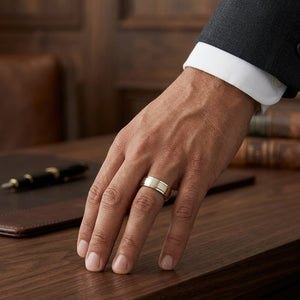 7mm Satin Finish Carved Wedding Band in 14K Yellow Gold, worn on hand, masculine full view