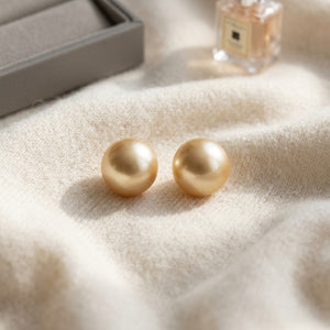 Golden South Sea Pearl Stud Earrings in 14K Yellow Gold - flat lay