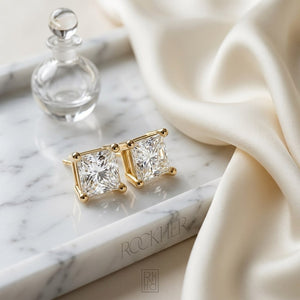 14k Yellow Gold 4-prong Princess Diamond Stud Earrings (0.32 Ct. T.w., Si1-2 Clarity, H-i Color), on marble vanity tray with silk