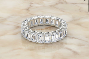 Emerald cut natural diamond eternity band in 14K white gold, front