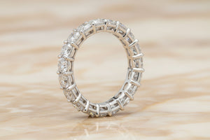 Cushion cut natural diamond eternity band in 14K white gold, profile