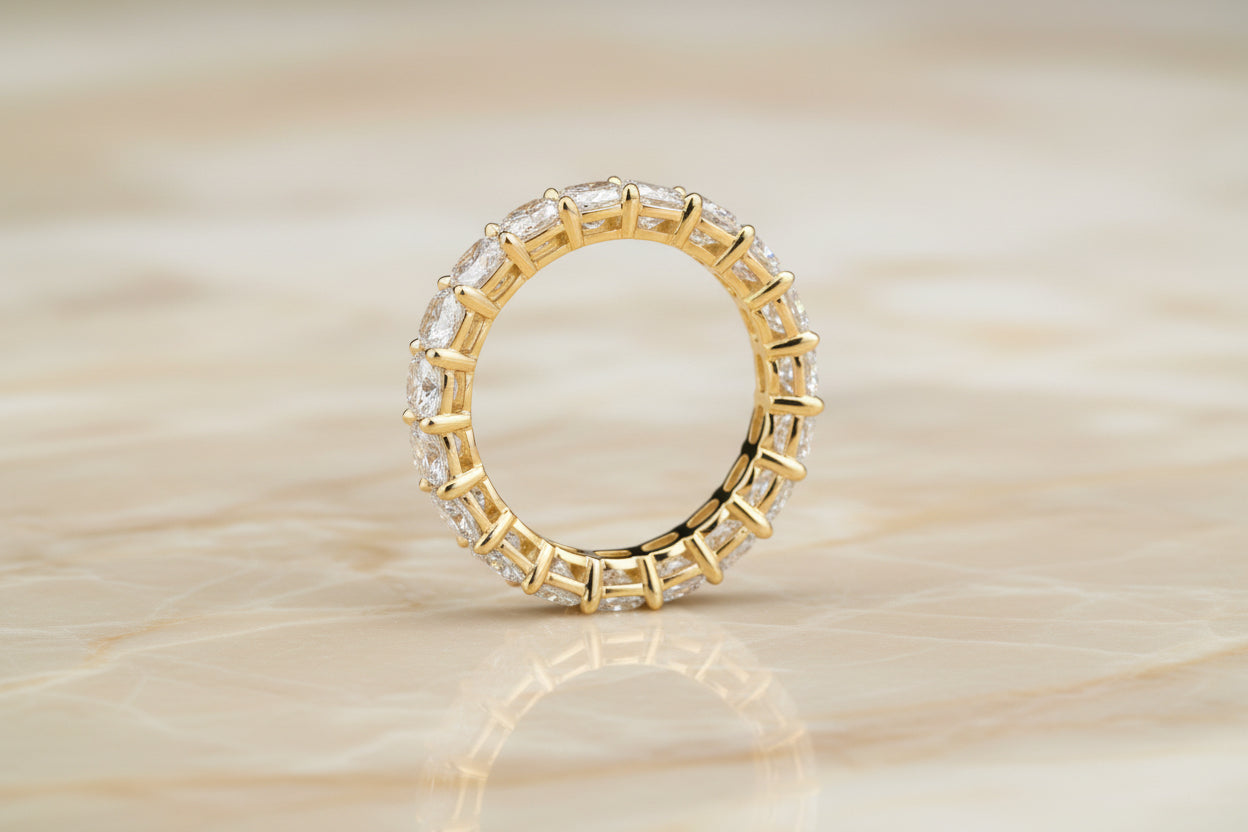 Cushion cut natural diamond eternity band in 14K yellow gold — profile