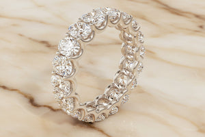 Oval cut natural diamond eternity band in 14K white gold, profile