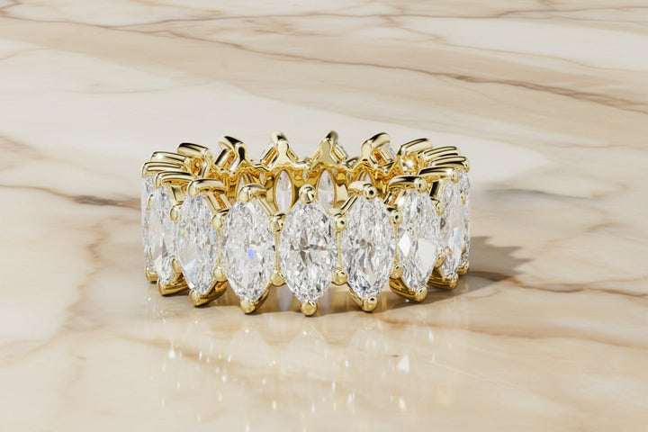 Marquise cut natural diamond eternity band in 14K yellow gold — front