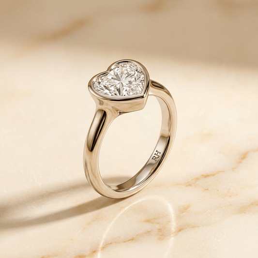 The Agnes bezel solitaire heart engagement ring setting in platinum — alt-angle hero — RockHer