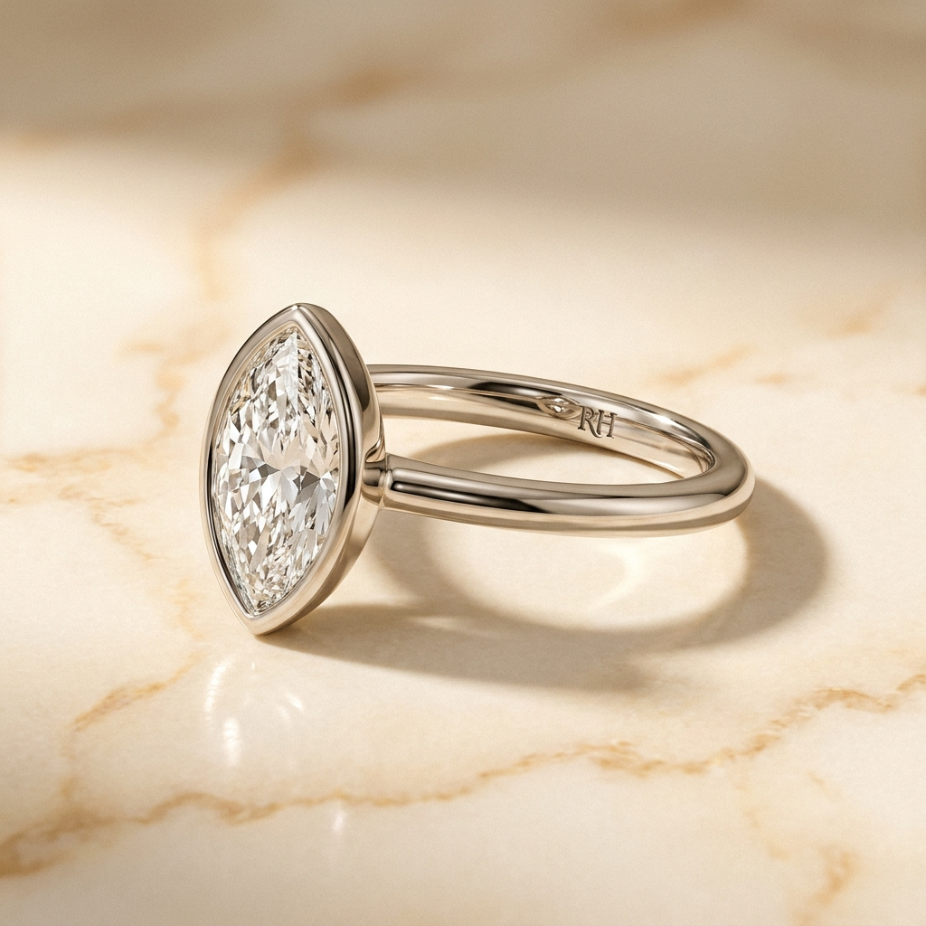 The Agnes Select bezel solitaire marquise engagement ring in platinum — alt-angle hero — RockHer