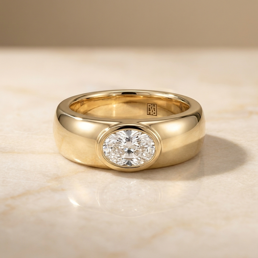 The Remi — Bezel-Set Cigar Band Oval in 18K Yellow Gold