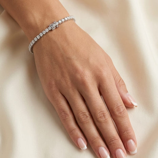 Diamond 4-prong Tennis Bracelet in Platinum in 14K White Gold, worn on hand, close-up