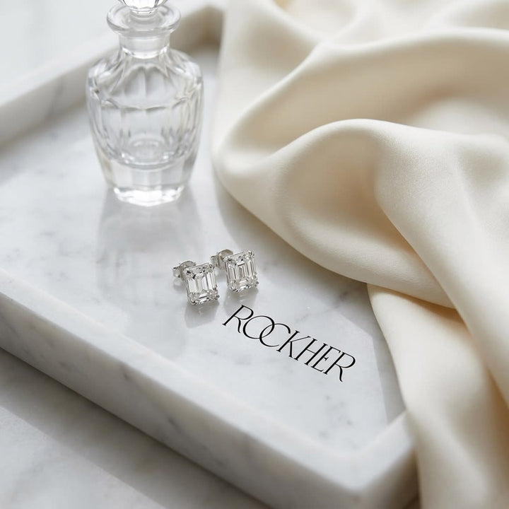Natural Diamond Asscher Cut Stud Earrings in Platinum, 3 ct. t.w., on marble vanity tray with silk
