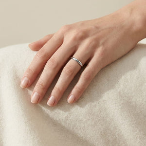 2mm Slightly Domed Traditional Oval Wedding Band in Platinum, worn on hand, full view