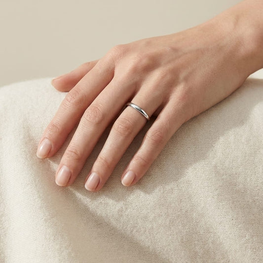 2mm Slightly Domed Traditional Oval Wedding Band in Platinum, worn on hand, full view