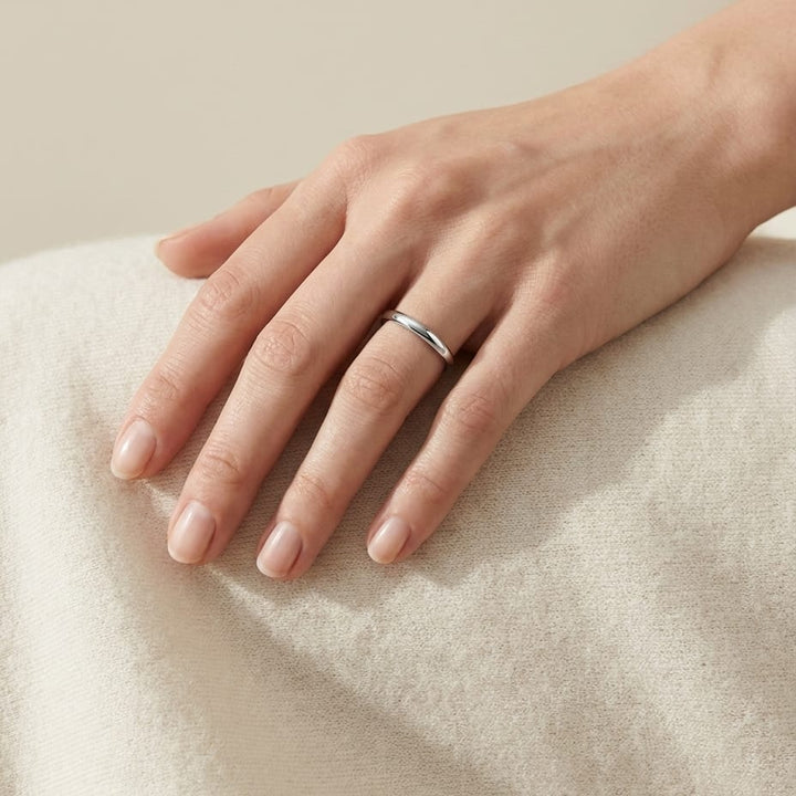 2mm Slightly Domed Traditional Oval Wedding Band in Platinum, worn on hand, full view