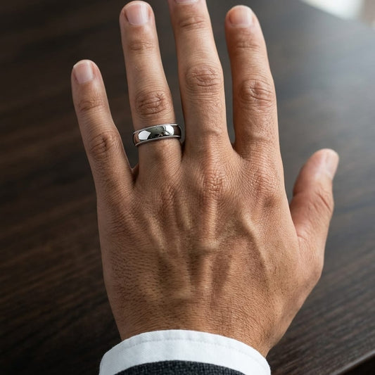 6mm Slightly Domed Traditional Oval Milgrain Wedding Band in Platinum, worn on hand, masculine close-up