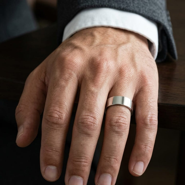 8mm Flat Comfort-Fit Wedding Band in Platinum, worn on hand, masculine close-up