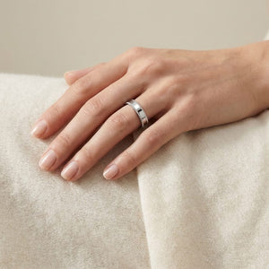4mm Flat Milgrain Comfort-Fit Wedding Band in Platinum, worn on hand, full view