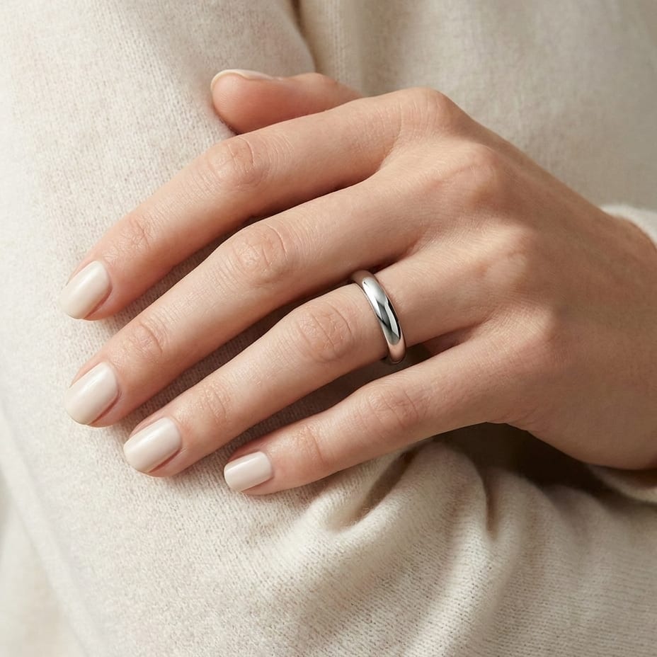 3mm High Dome Comfort-Fit Wedding Band in Platinum, worn on hand, close-up