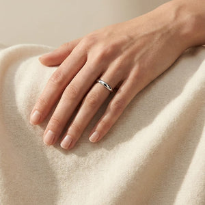 2.5mm High Dome Comfort-Fit Wedding Band in Platinum, worn on hand, full view