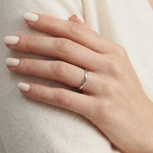 2mm Slightly Domed Comfort-Fit Wedding Band in Platinum, worn on hand, close-up