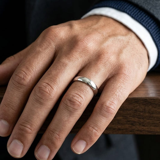 6mm Slightly Domed Comfort-Fit Wedding Band in Platinum, worn on hand, masculine close-up